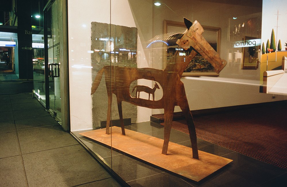 sculpture of pregnant horse